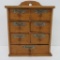 Seven drawer spice cabinet