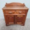 Walnut Commode with Carved Nut Drawer Pulls