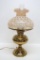 Bradley and Hubbard electrified oil lamp with a coin spot shade