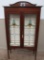 Ornate leaded glass two door cabinet