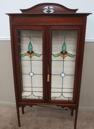 Ornate leaded glass two door cabinet