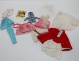 Lot of tagged Barbie clothing and outfits