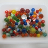 Approximately 90 machine made marbles