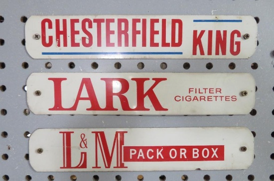 Three vintage cigarette signs