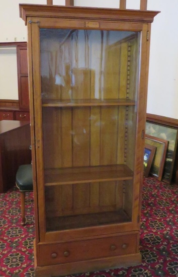 Bookcase with single glass door and drawer