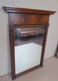 Ornate walnut wall mirror