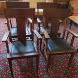 Four T back armed side chairs