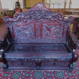 Heavily carved oriental entry bench