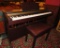 Roland electric piano HP101 with bench, working