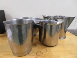 Stainless steel pitchers and serving bowl