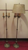 Two matching three light floor lamps