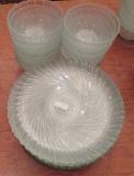 Swirl pattern glass plates and bowls