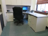 Office cubicle with upper cabinets and files