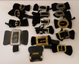 Assorted shoe clips, pairs and singles