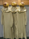 Three green trimmed robes and turbins