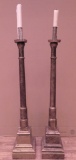 Two wooden candle stands, 5'