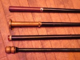 Four wooden scepters, theatre props