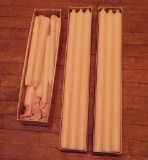 Three boxes of large pillar cathedral candles