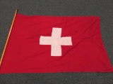 Swiss Flag, cloth on wood pole