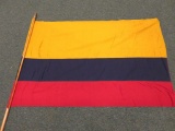 Flag of Columbia, cloth on wood pole