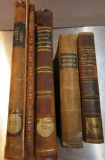 Five leather bound books