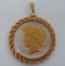 1927 Peace Silver Dollar with metal bezel and gold wash