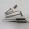 Six metal advertising ice picks, button hook and souvenir hammers