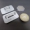 Four Advertising Paperweights