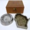 Two industrial metal advertising ashtrays and wooden cigar box