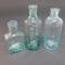 Three open pontil bottles, 3