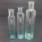 Three open pontil medicine bottles, cylinders