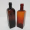 Two Bitters bottles, one Chicago, 9 1/2