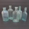 Five Stove Polish and Blueing Bottles, 6