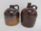 Two Stoneware Jugs, Red Wing (unusual mark) and C Hermann & Co