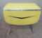 Yellow enamel top drop leaf and chrome drop leaf table