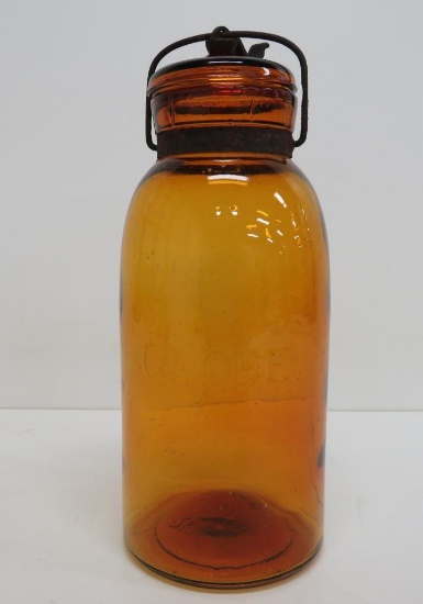 Amber Globe bail handle fruit jar, 10"