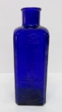 Cobalt Blue Owl Drug Company square bottle, 9 1/2