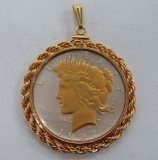 1927 Peace Silver Dollar with metal bezel and gold wash