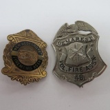 Two Fire Dept Association Badges