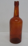 Policy Rye bottle, M Weiner & Co Milwaukee, amber