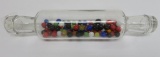 Glass rollling pin with marbles, about 78 vintage marbles