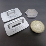 Four Advertising Paperweights