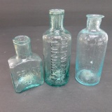 Three open pontil bottles, 3