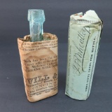 Two Medicine bottles with instruction papers, 5