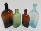 Four multi colored flask bottles, 6