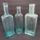 Three vintage medicine bottles, 6