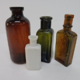Four multi color lot of early bottles, 3