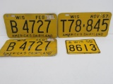 Four 1950's Wisconsin License plates, one matched number set