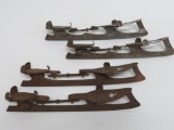 Two pair of metal ice skates