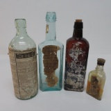 Four Partial Label bottles, Sperm oil, Bitters and Liniment